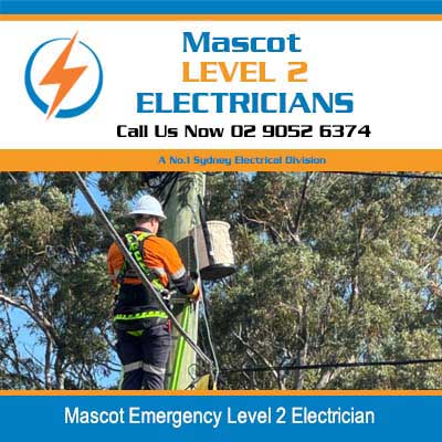 Emergency level 2 electrician in elevated work platform performing overhead power line repairs in Mascot