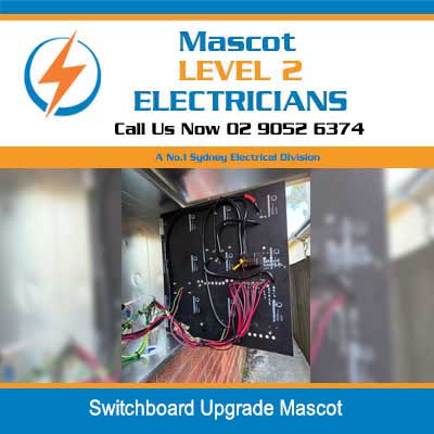 Open electrical switchboard with circuit breakers and colorful wiring during upgrade in Mascot
